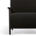 Nosh Meghan Sessel mit Boucl-Bezug in Schwarz und Beine aus massiver Esche mit Wenge-Finish
